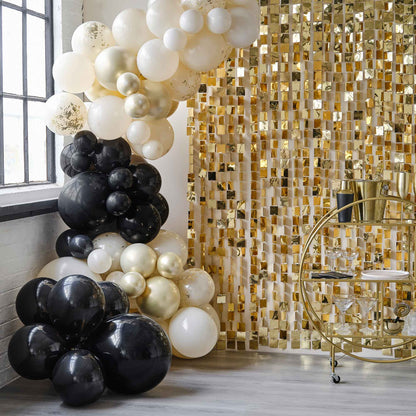 black nude champagne gold balloon arch party backdrop modern event décor Australia