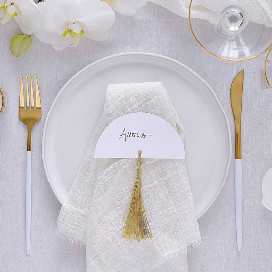 white wedding place cards with gold tassels elegant table décor