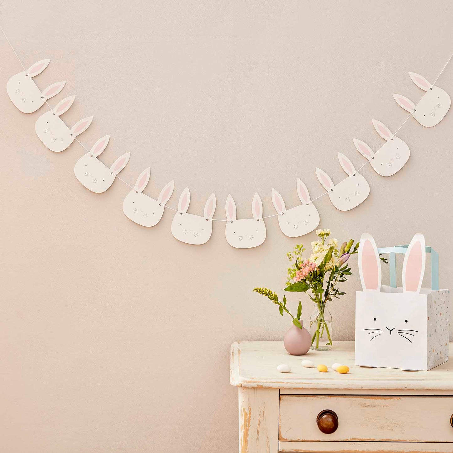pink and white Easter bunny face bunting hanging for holiday party décor