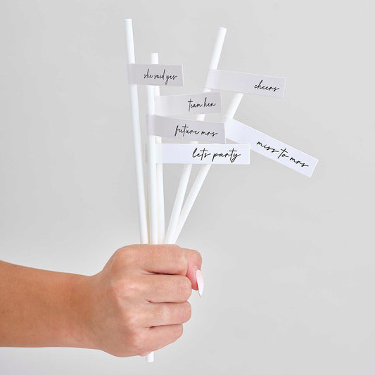 off-white “Team Bride” paper straws for hen party drinks