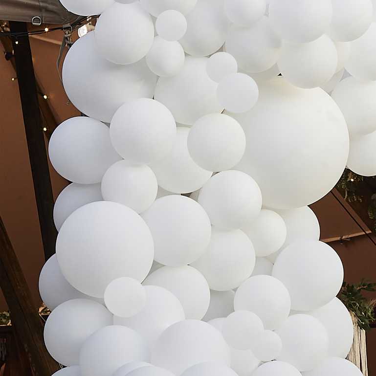 White balloon garland backdrop for weddings birthdays and baby showers

