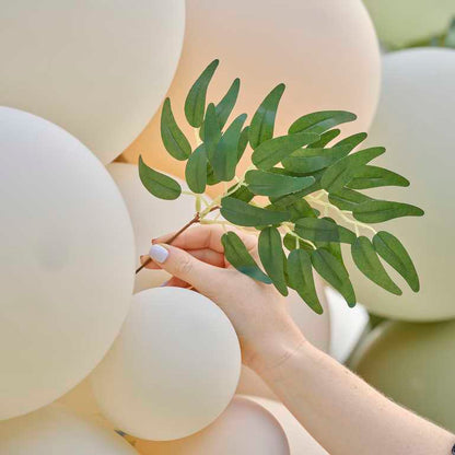 botanical balloon garland taupe peach sage eucalyptus wedding backdrop modern event styling
