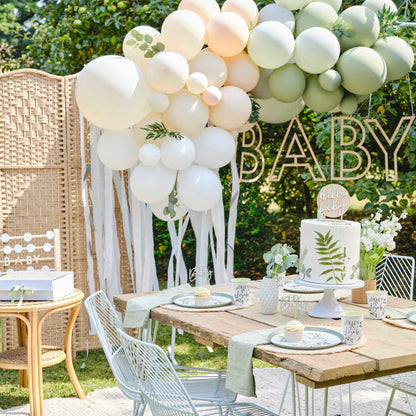 pastel balloon arch with greenery foliage taupe peach sage birthday baby shower arch
