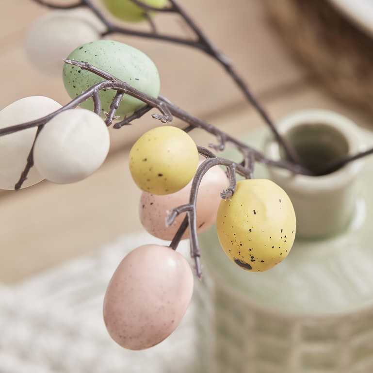 artificial egg stems in vase for Easter home décor and celebration