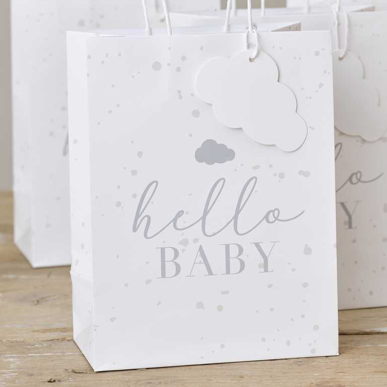 Neutral baby shower gift bags speckled paper bags with cloud tag