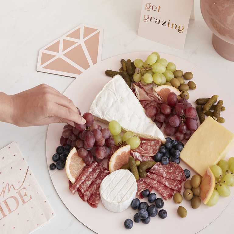 ring shaped grazing board rose gold and pink cheese fruit platter bridal shower backdrop