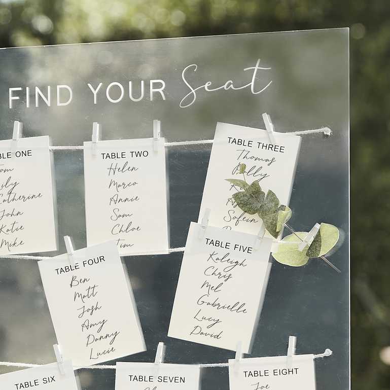 clear acrylic seating plan with wooden stand wedding reception décor elegant table chart